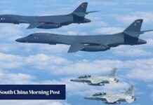 Philippine and US planes send message to China near shoal. philippine-and-us-planes-send-message-to-china-near-shoal