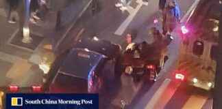 Pedestrians rescue girl trapped under taxi in Hong Kong pedestrians-rescue-girl-trapped-under-taxi-in-hong-kong