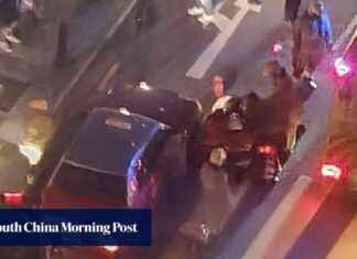 Pedestrians rescue girl trapped under taxi in Hong Kong pedestrians-rescue-girl-trapped-under-taxi-in-hong-kong